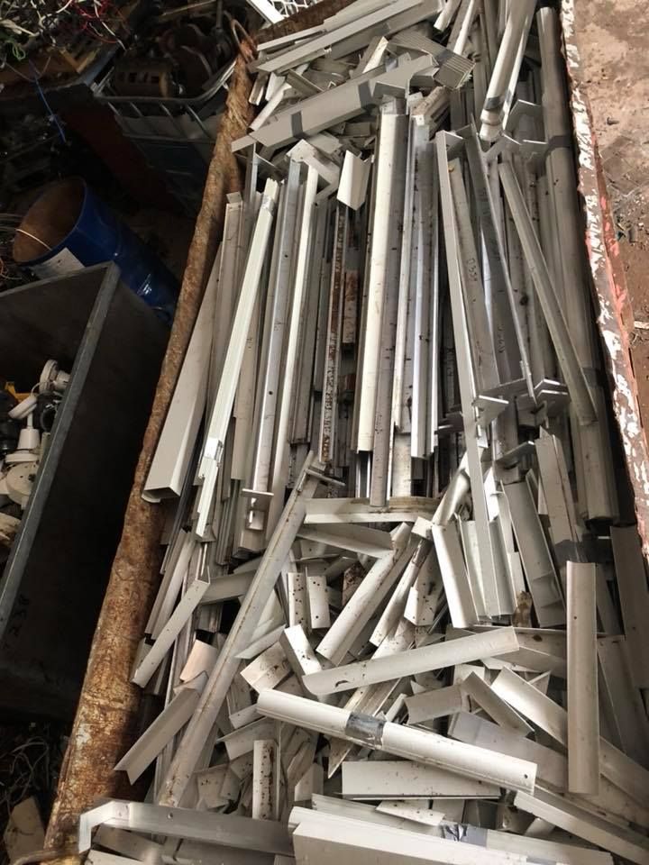 Scrap Metal Pile, Primarily Long White Aluminum Extrusions — H&H Metal Recycling in Bells Creek, QLD