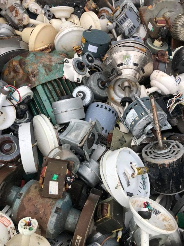 Pile Of Discarded Ceiling Fan Motors And Housings — H&H Metal Recycling in Gympie, QLD
