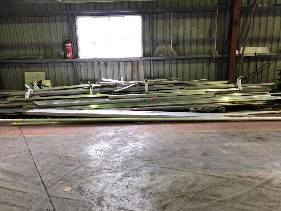 Warehouse Interior With Metal Beams And Concrete Floor — H&H Metal Recycling in Mudjimba, QLD