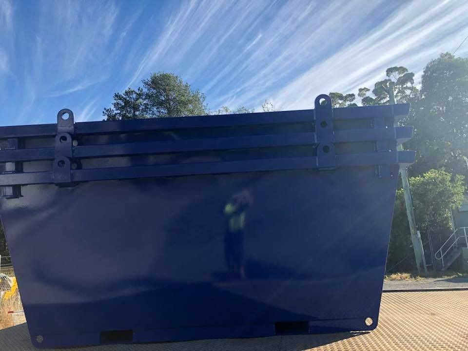 A Blue Dumpster Is Sitting on The Ground in Front of A Blue Sky — H & H Metal Recycling In Kunda Park, QLD