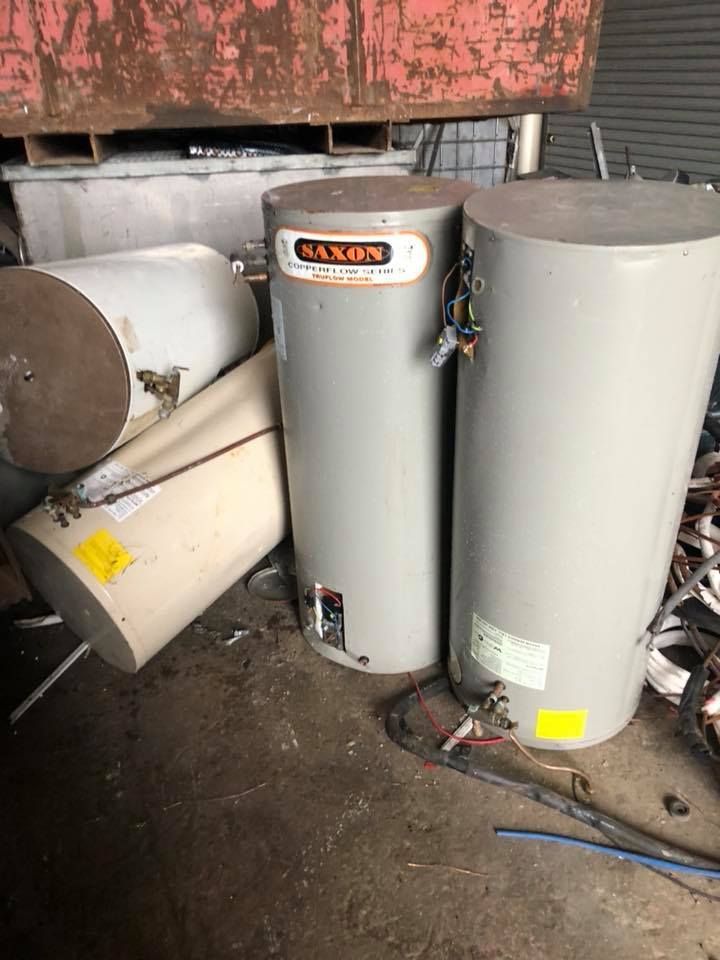 Discarded Water Heaters In A Junkyard — H&H Metal Recycling in Mudjimba, QLD