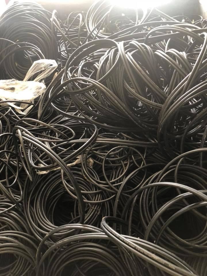 Tangled Pile Of Black Cables, Possibly Electrical Wiring, In A Disorganized Heap — H&H Metal Recycling in Beerwah, QLD