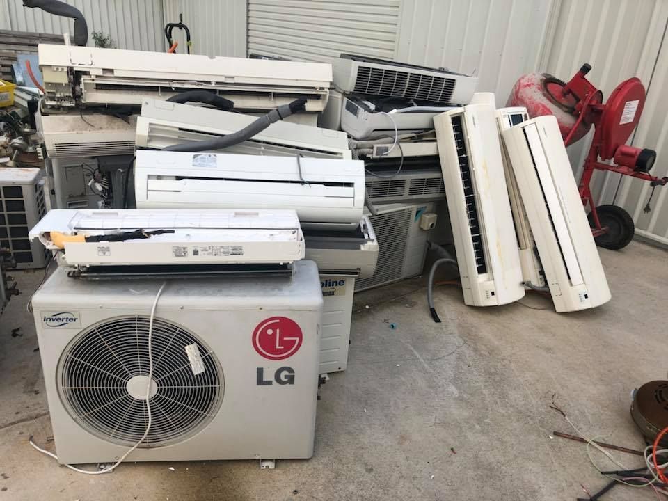 Pile Of Discarded Air Conditioners, Including An Lg Unit — H&H Metal Recycling in Beerwah, QLD