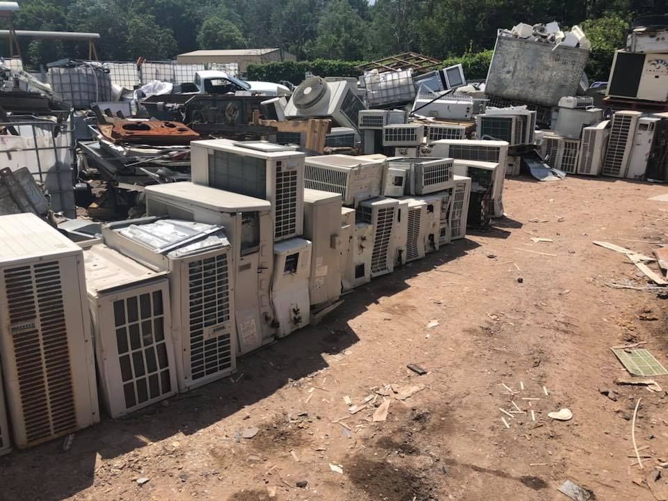 Pile Of Discarded Air Conditioners In A Scrap Yard — H&H Metal Recycling in Moffat Beach, QLD