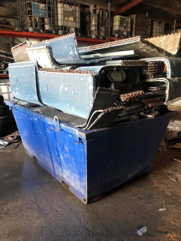 Blue Metal Bin Filled With Scrap Metal — H&H Metal Recycling in Glass House Mountains, QLD