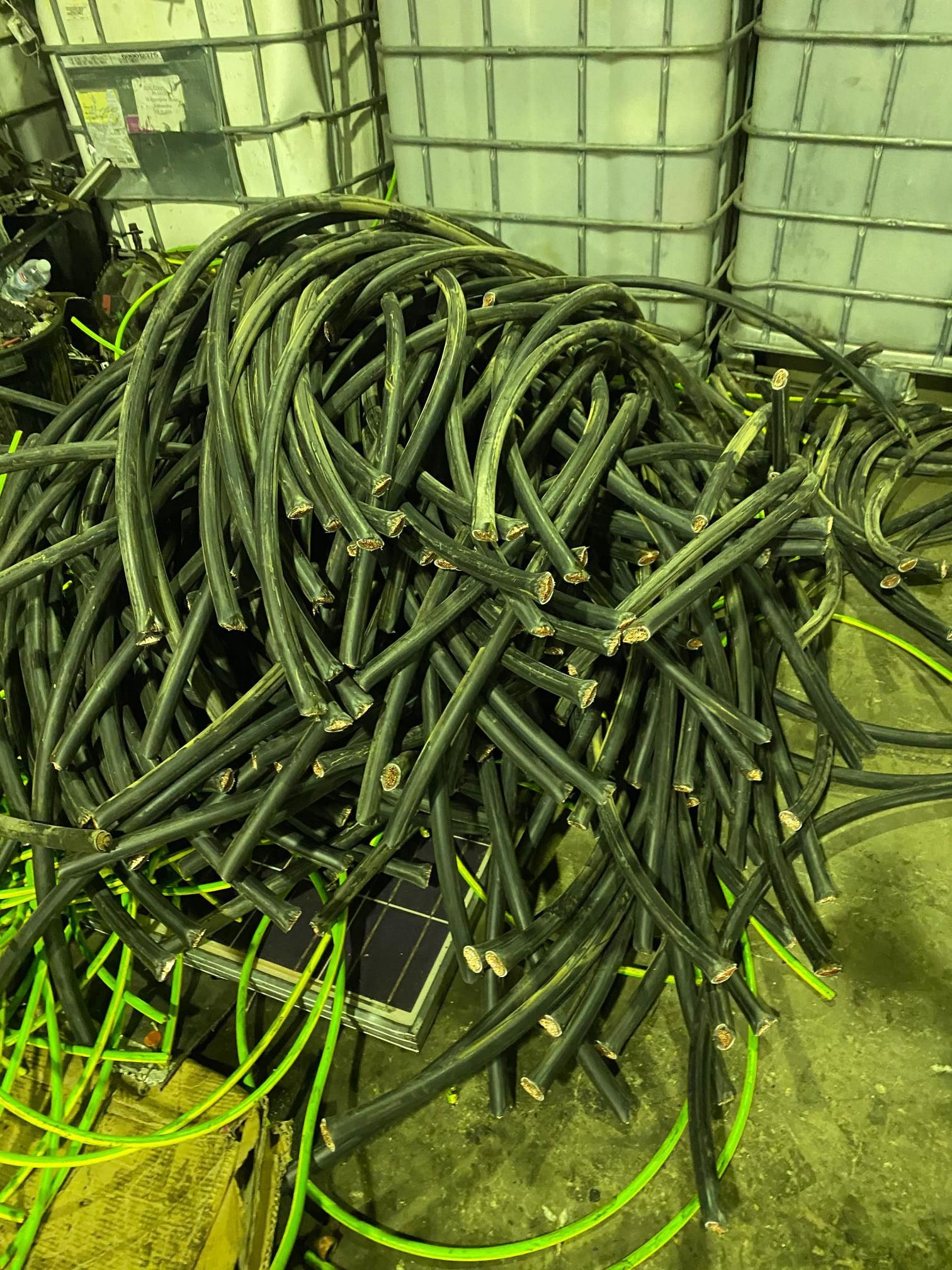Pile Of Black Wires With Exposed Copper Ends — H&H Metal Recycling in Glass House Mountains, QLD