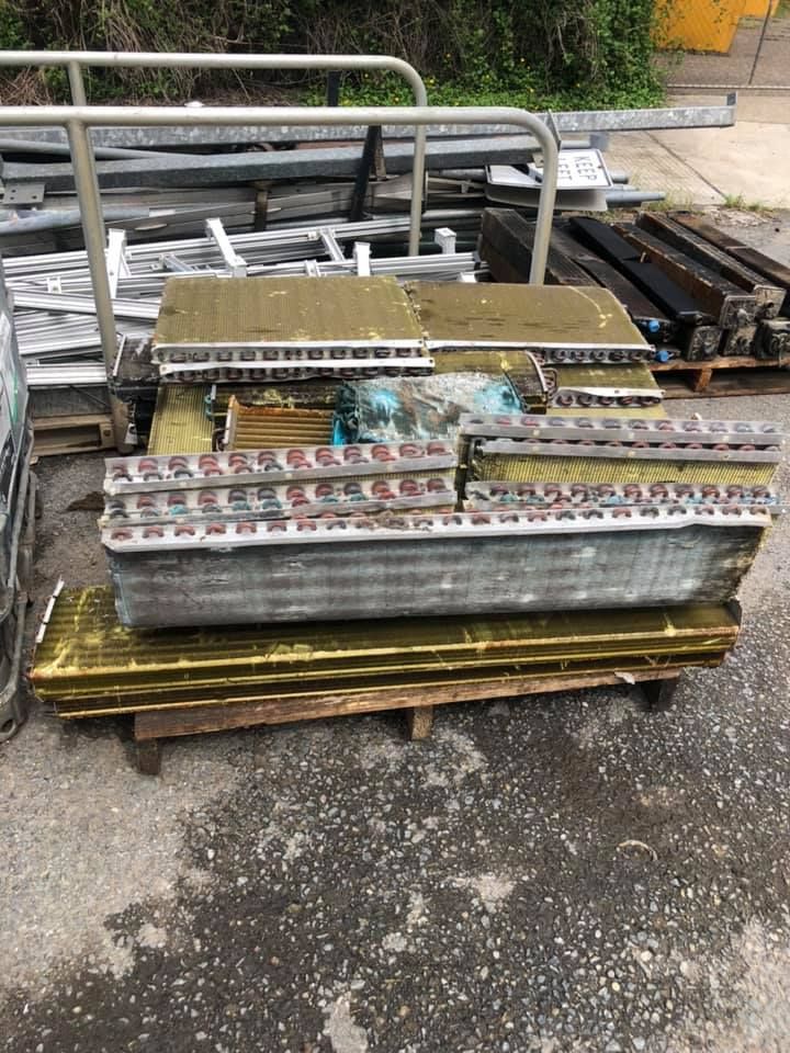 Cart Loaded With Discarded Air Conditioning Coils And Metal Scraps Outside — H&H Metal Recycling in Caloundra West, QLD