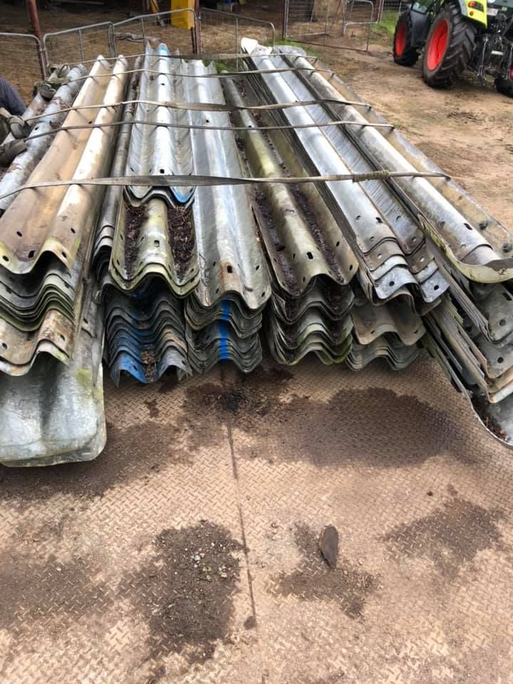 Stacked Corrugated Metal Sheets — H&H Metal Recycling in Caloundra West, QLD