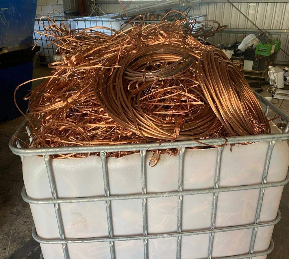 A White Bin Filled with A Pile of Copper Wire — H & H Metal Recycling In Kawana Waters, QLD