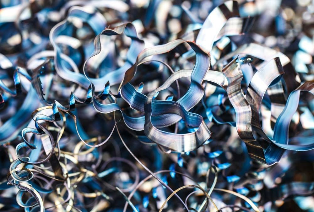 A Close up Of a Pile of Blue Metal Shavings — H & H Metal Recycling In Kunda Park, QLD