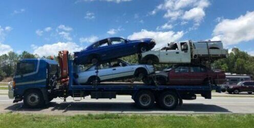 Old Cars Getting Towed — H & H Metal Recycling In Kunda Park, QLD