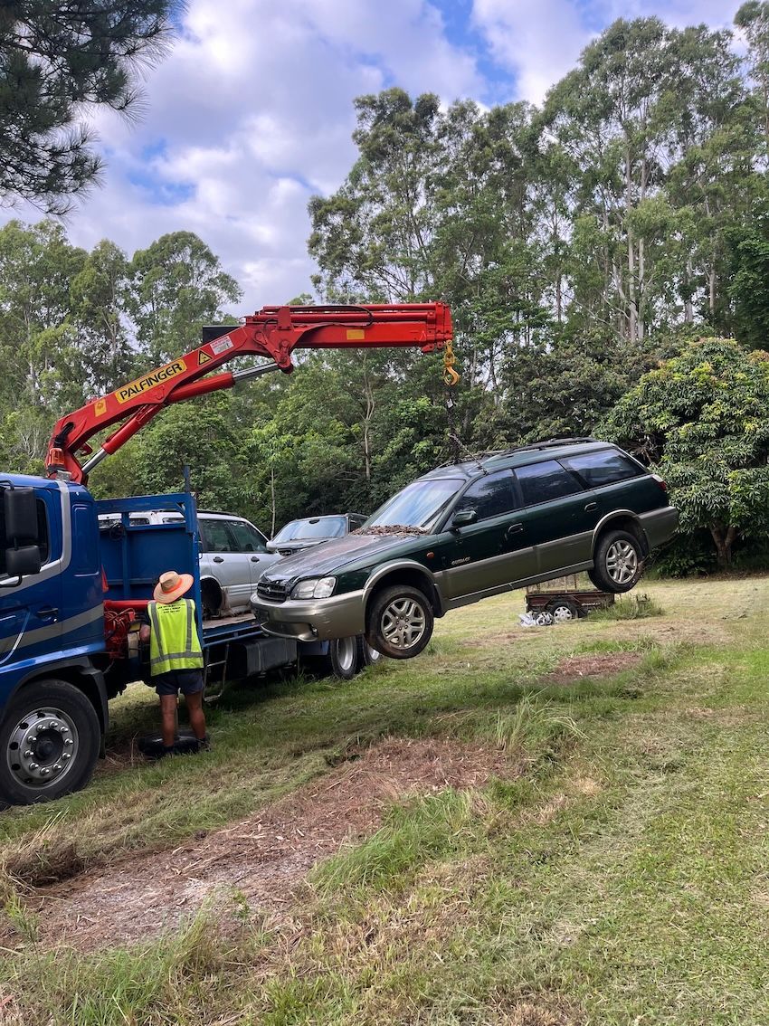 A Car Being Picked Up By A Crane Truck — H & H Metal Recycling In Kunda Park, QLD