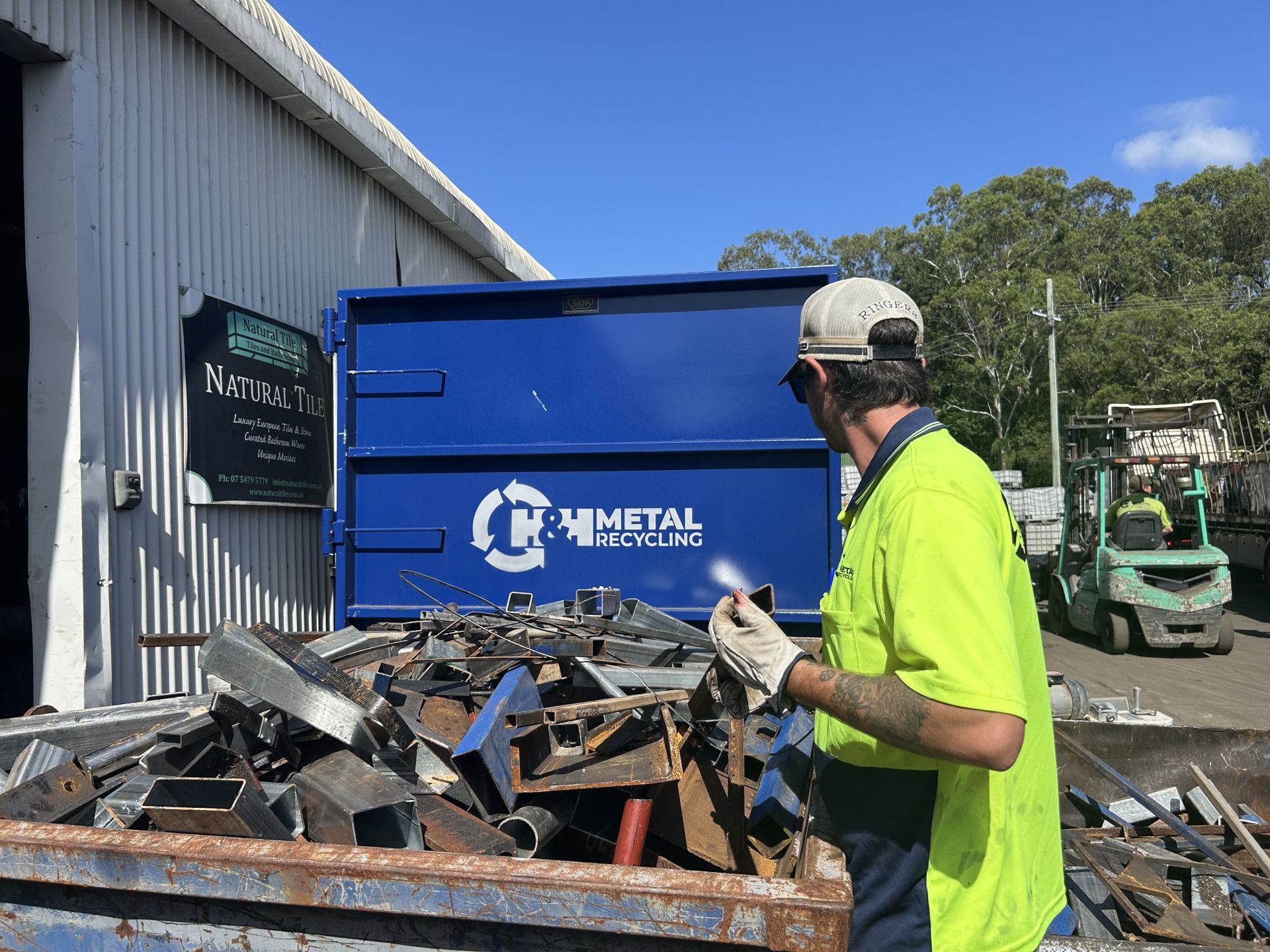 A Pile of Scrap Metal Is Sitting on Top of Each Other — H & H Metal Recycling In Kunda Park, QLD