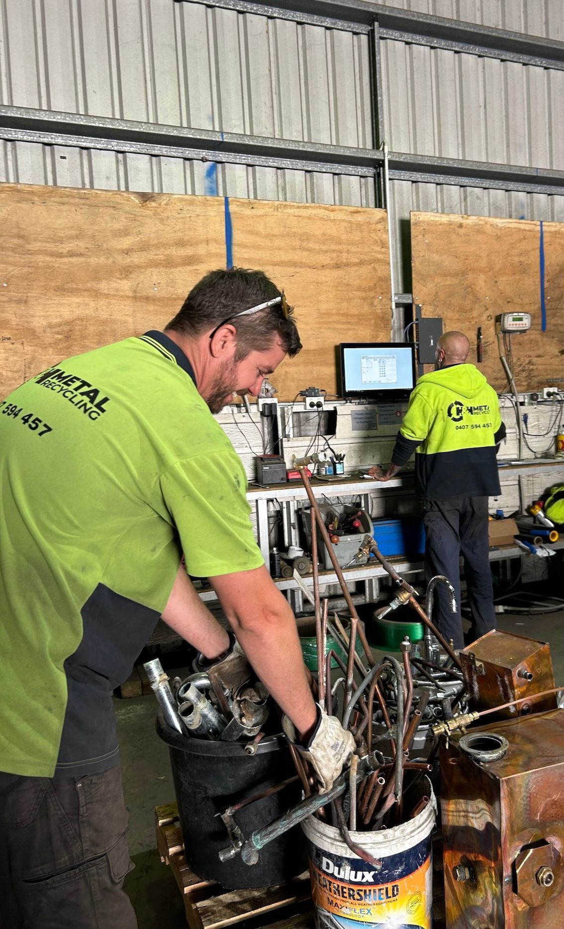 A Pile of Wrecked Cars Are Stacked on Top of Each Other — H & H Metal Recycling In Kunda Park, QLD