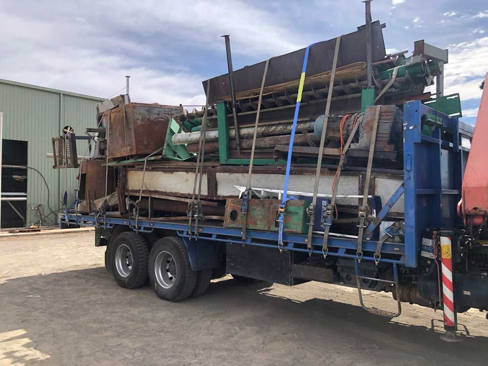 A Blue Truck Is Loaded with A Lot of Metal — H & H Metal Recycling In Kunda Park, QLD