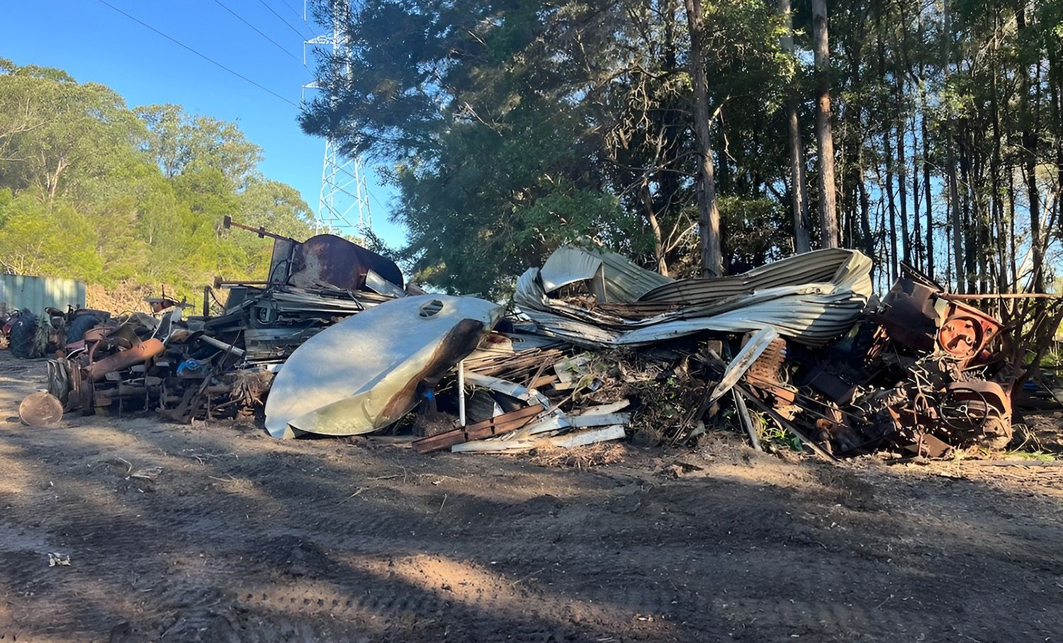 Pile Of Debris On The Side Of A Dirt Road