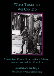 A child and a uniformed police officer stand in front of a police station with glass doors.