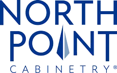 Logo for North Point Cabinetry, navy blue text and a blue and gray sail-like icon. 