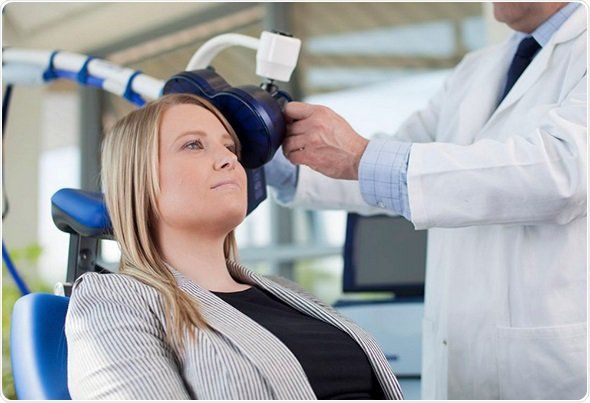 woman receiving tms therapy for depression