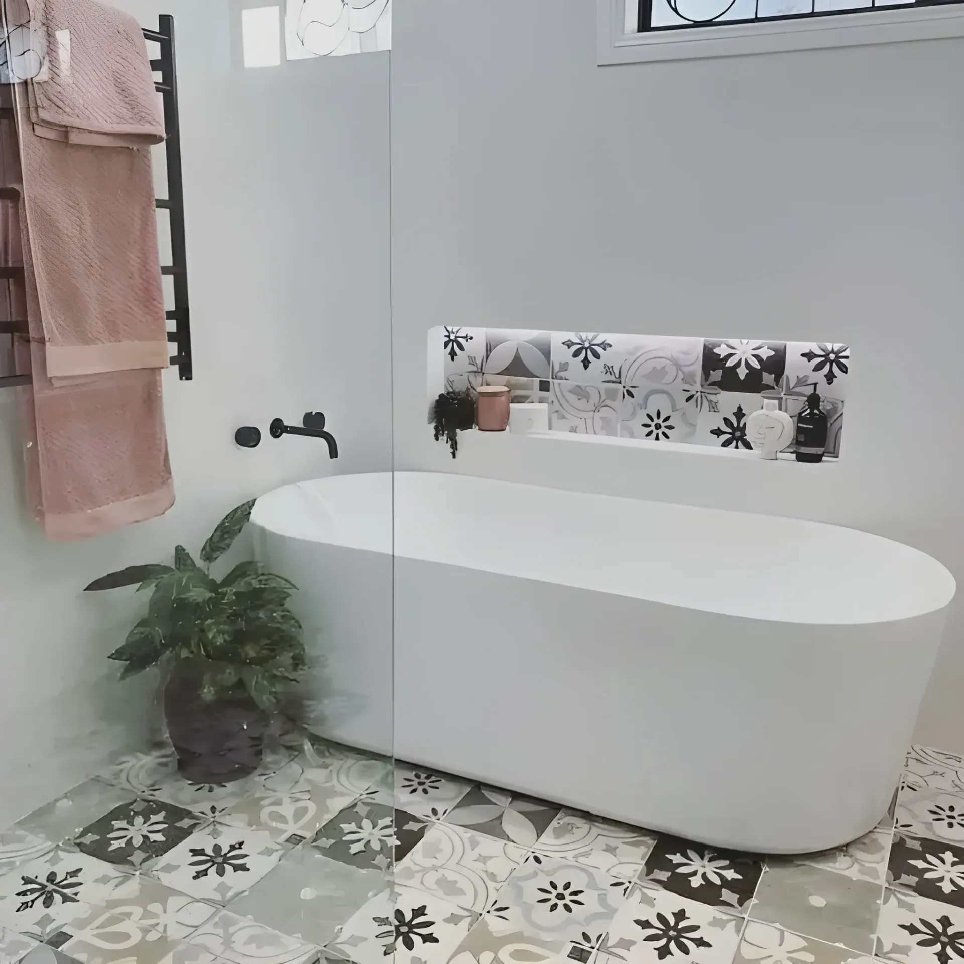 Modern Bathroom With a White Oval Tub — Cobra Plumbing & Bathrooms in Heathcote, NSW