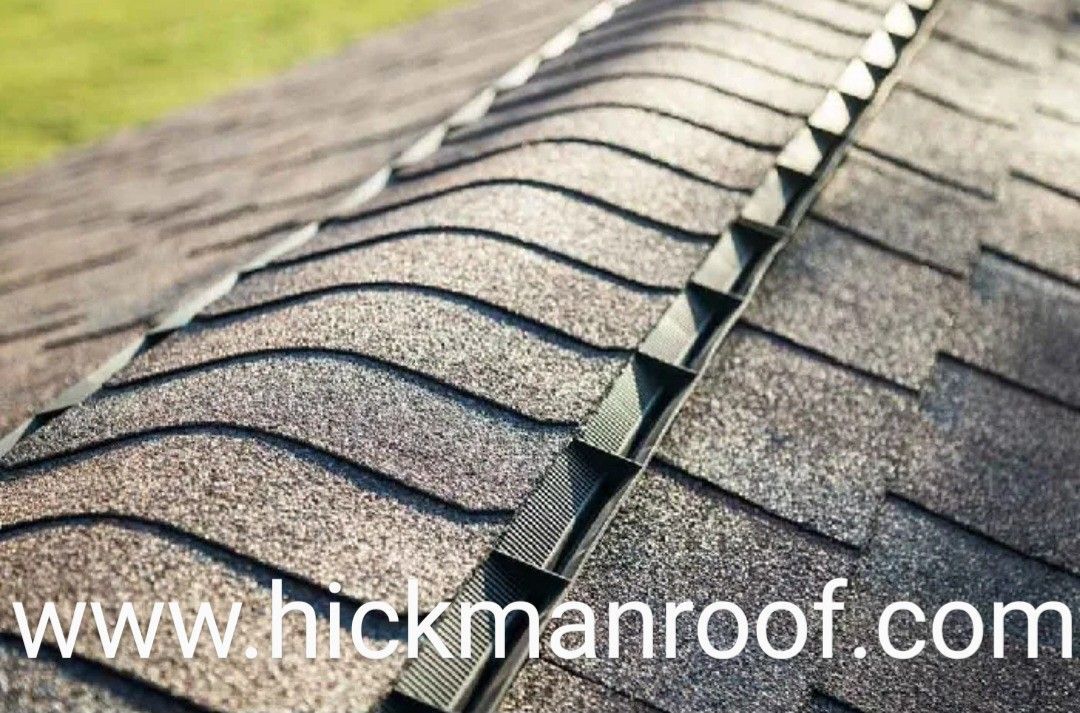 A close up of a roof with the website www.hickmanroof.com written on the bottom