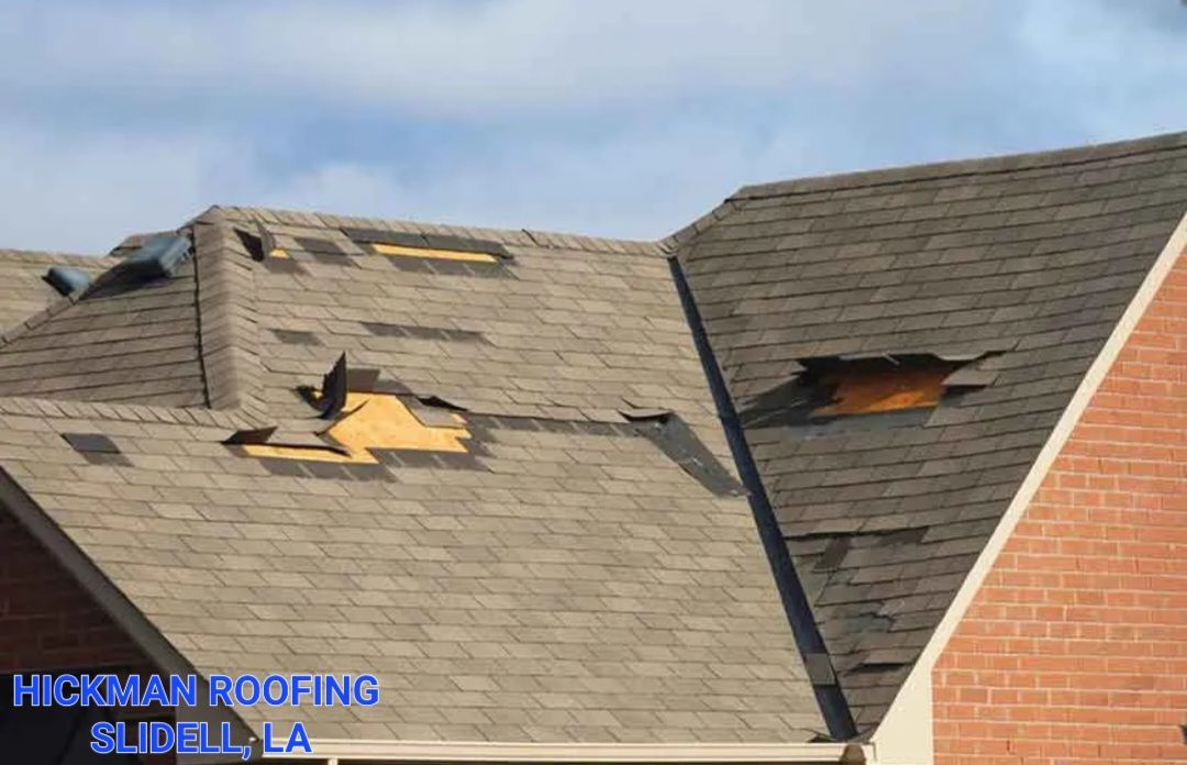 A house with a roof that has been damaged by a storm