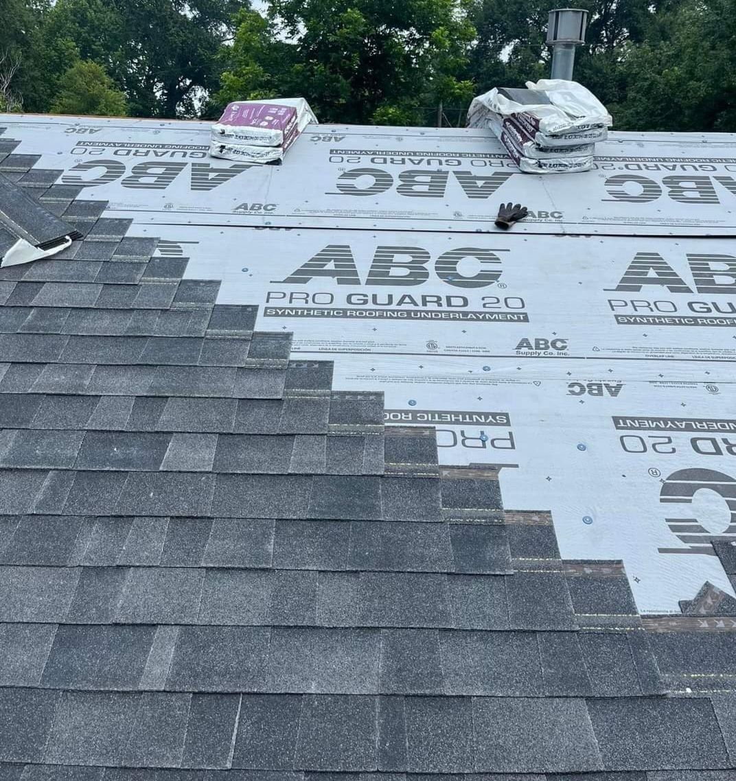 A roof with a lot of abc shingles on it