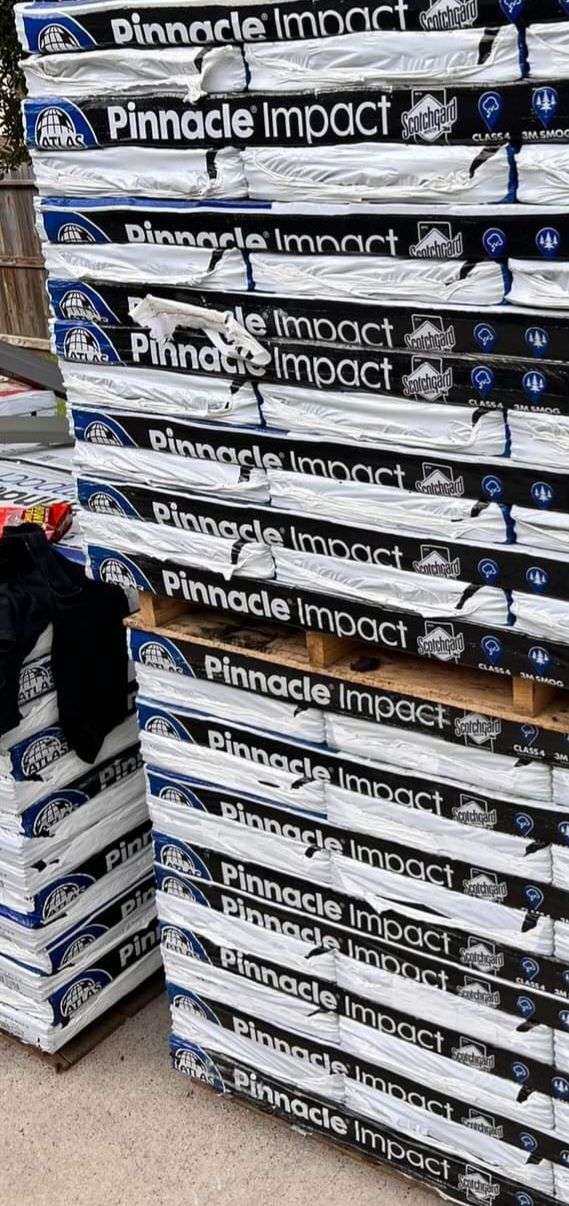 A stack of boxes sitting on top of each other on a table.