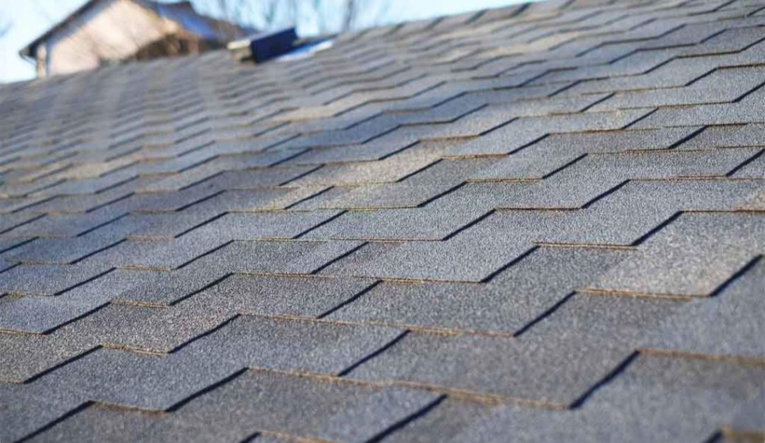 A close up of a roof with shingles on it.