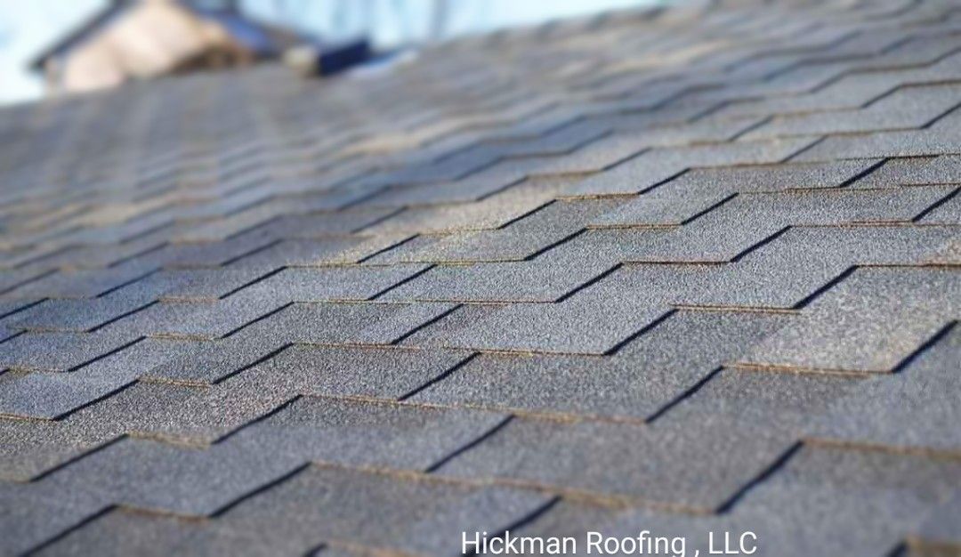 A close up of a roof with shingles on it