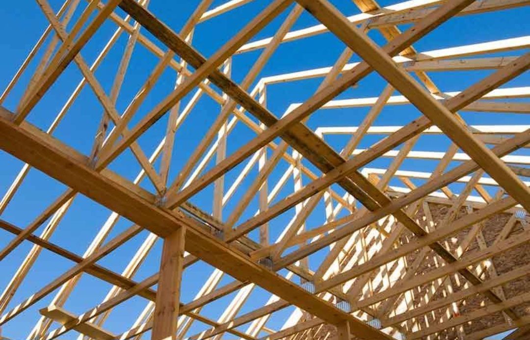 Looking up at the roof of a building under construction.