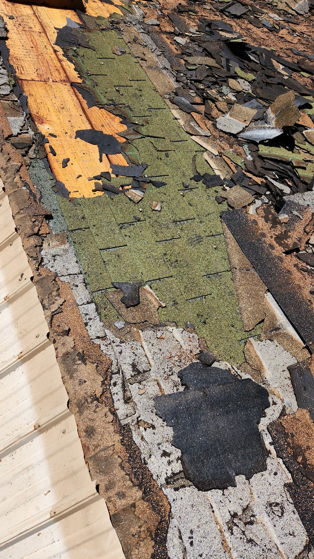 A close up of a piece of wood with a lot of dirt on it.