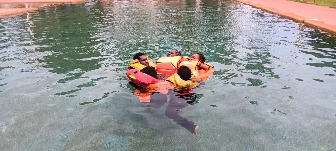 A Large Room With Tables And Chairs And A Projector Screen— On-Track Marine In Yorkeys Knob, QLD