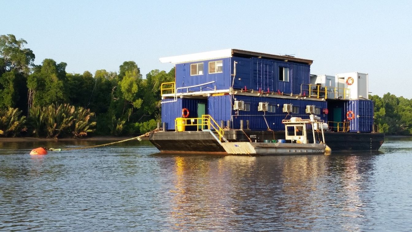 A Large Black And White Marine Vessel In Water— On-Track Marine In Yorkeys Knob, QLD