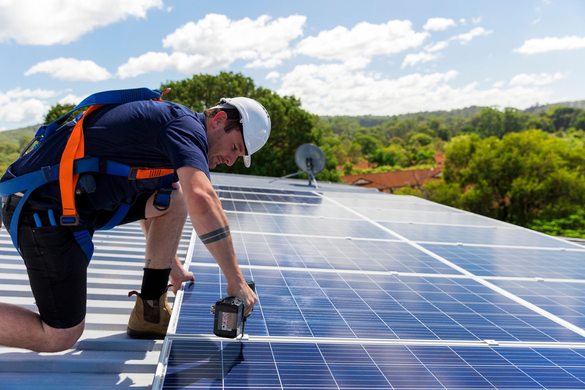 Man Installing Solar Panel — Mt Gambier, SA — Elevate Solar Cleaning & Home Maintenance