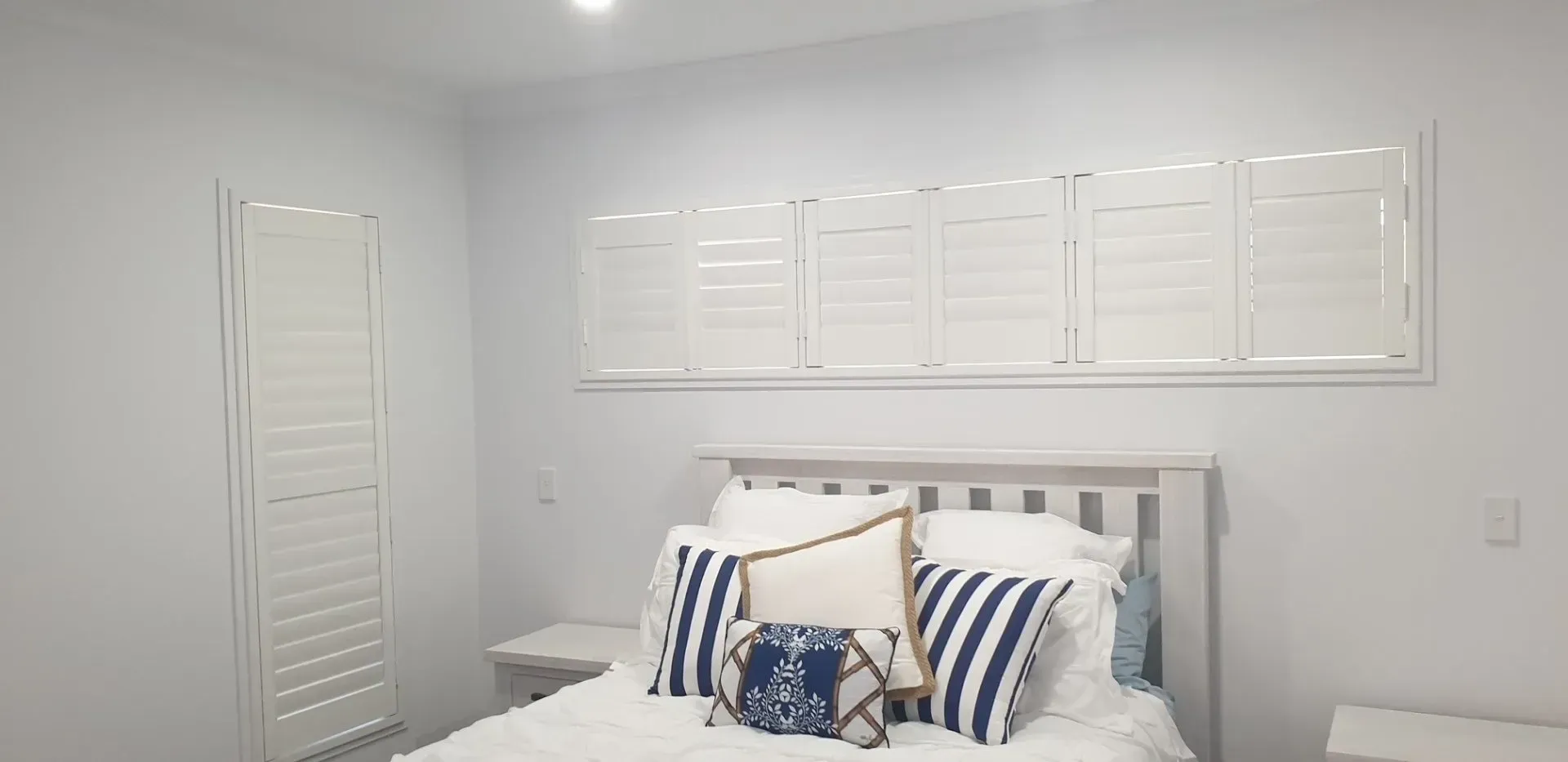 Small Shutters Over The Bed — Shutters in Bundaberg, QLD