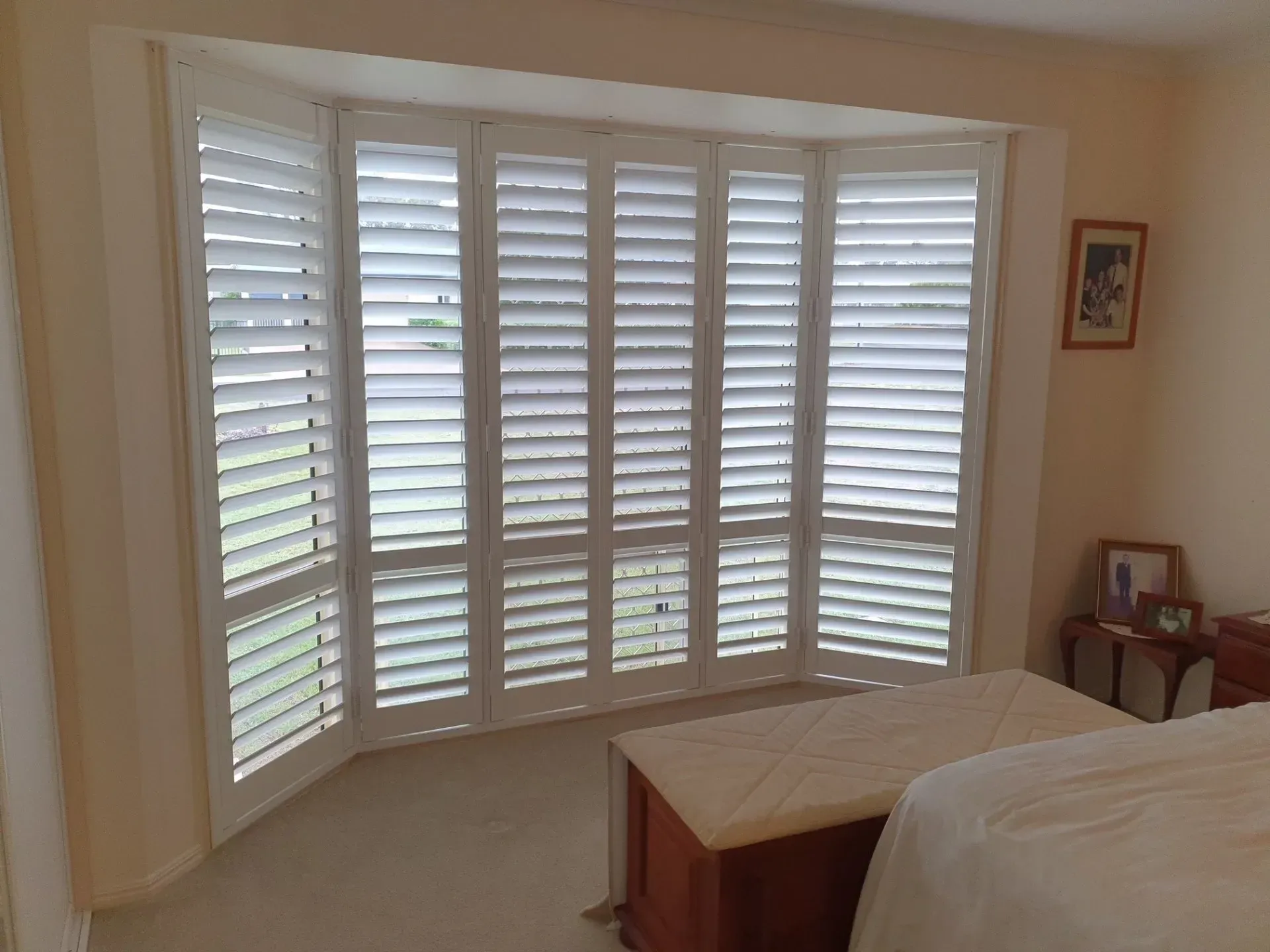 Bi-Fold Shutters In Bedroom — Shutters in Bundaberg, QLD