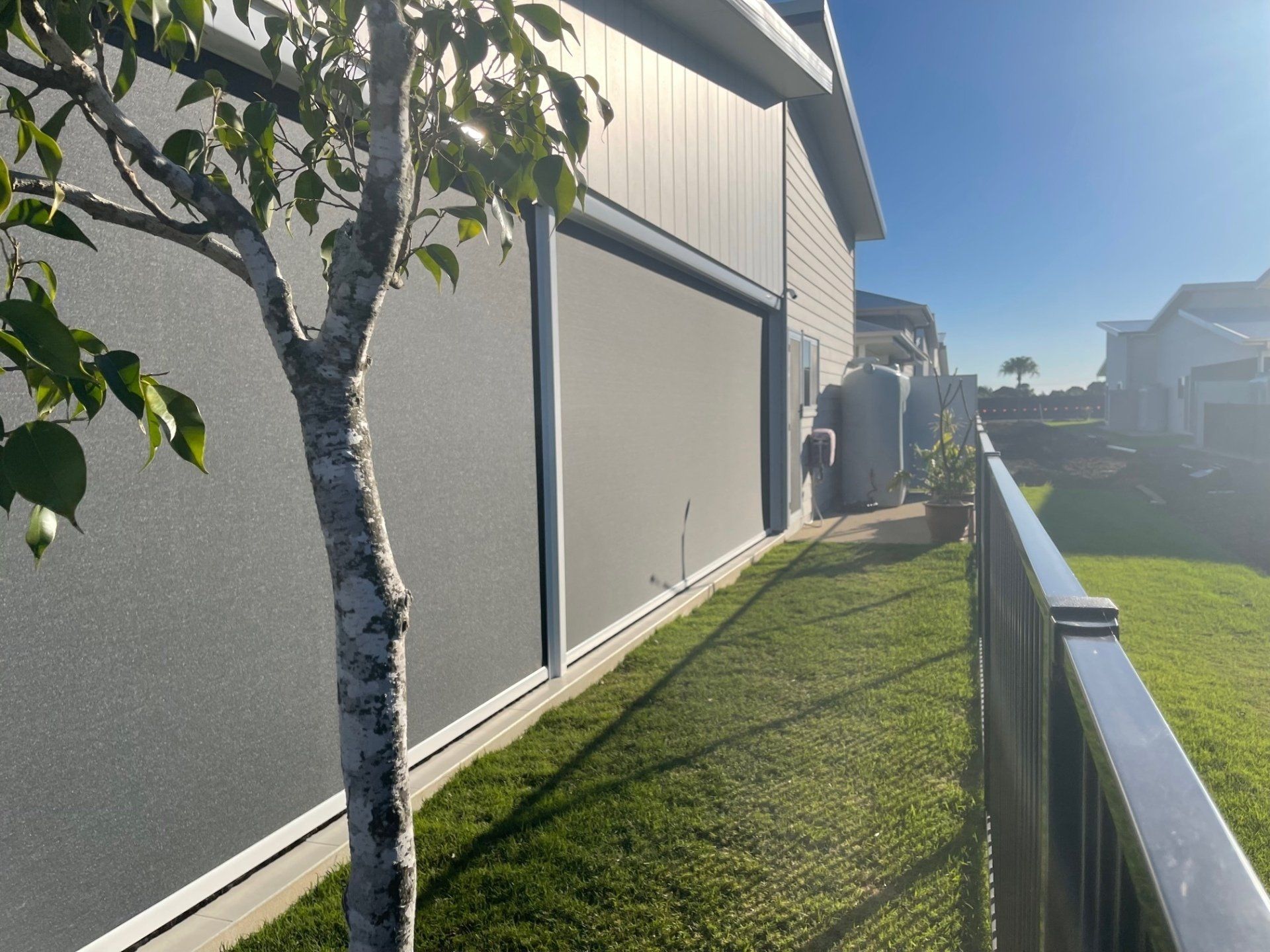 Grey Pull Down Awning — Shutters in Bundaberg, QLD