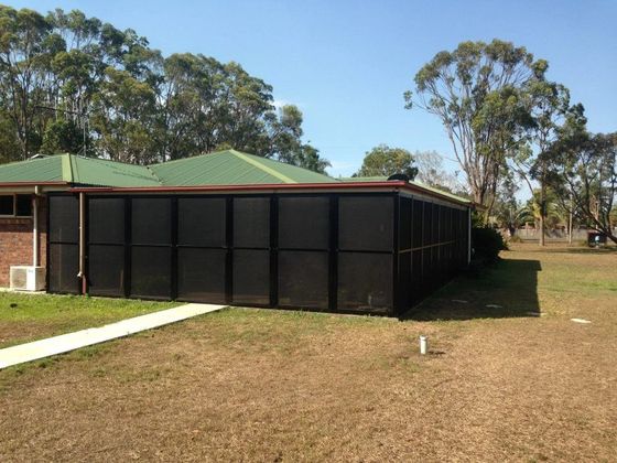 Large Metal Black Shutters — Shutters in Bundaberg, QLD