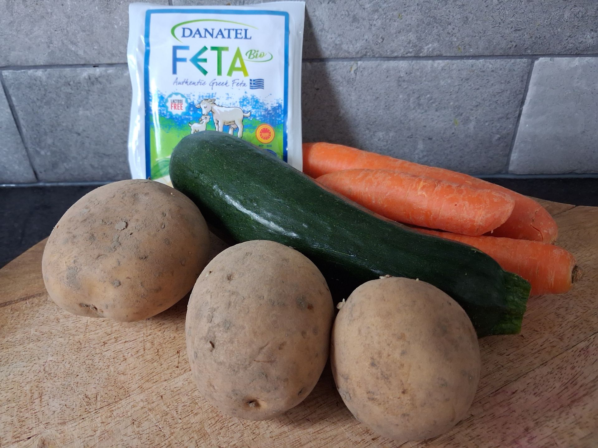 ovenschotel van aardappel, wortel, courgette en feta