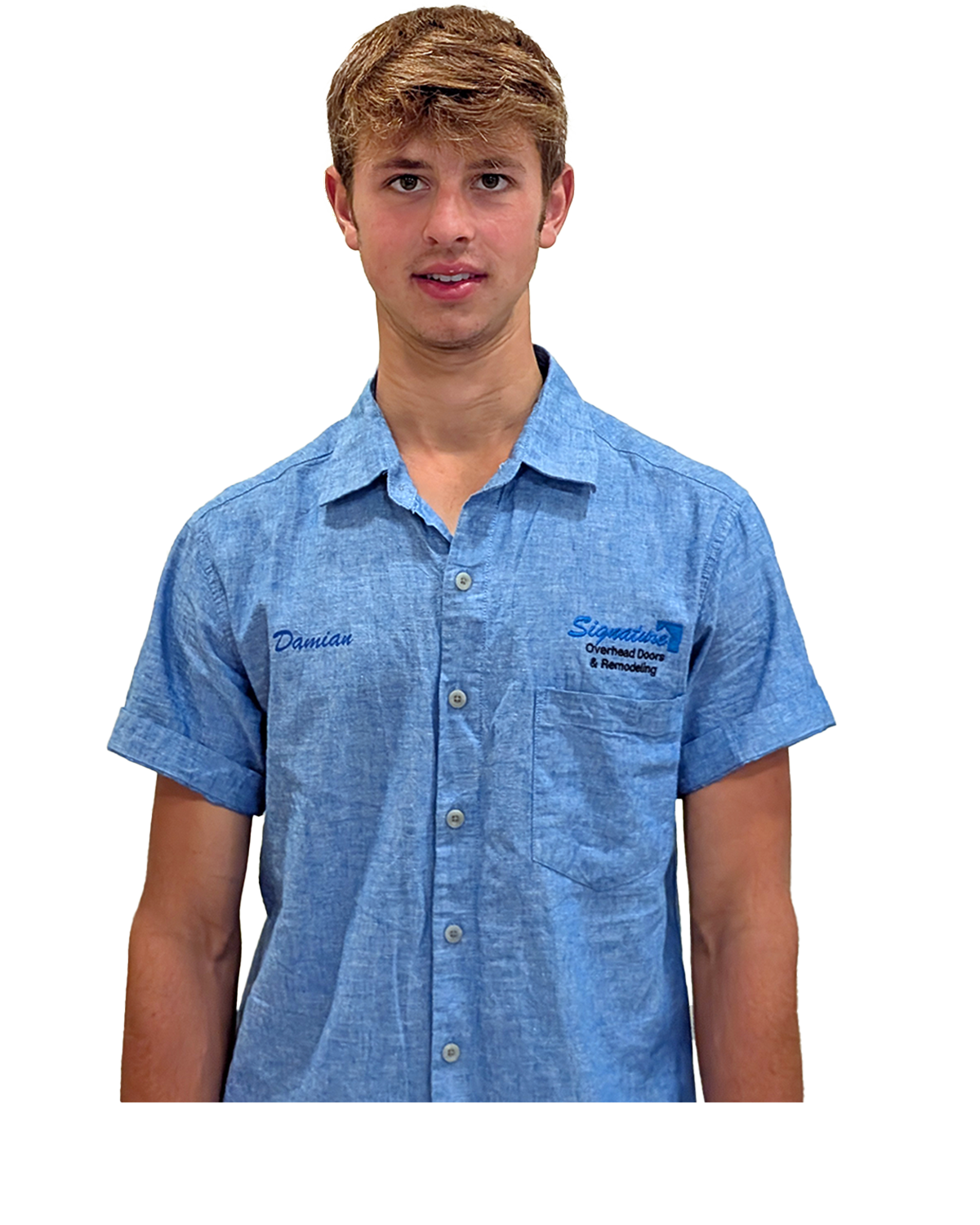 Teenager wearing a blue collared shirt smiling, standing against a white background.