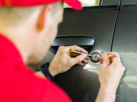 Opening Car Door With Lockpicker — Omaha, NE — Allied Locksmith Service