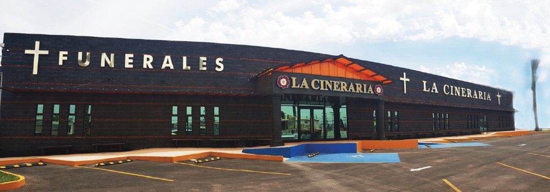 Un gran edificio con la palabra funerales en él.