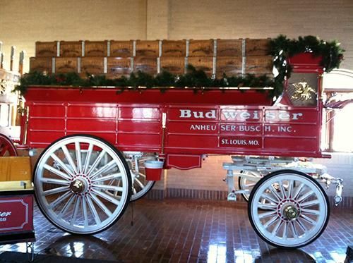 A red wagon with budweiser written on it