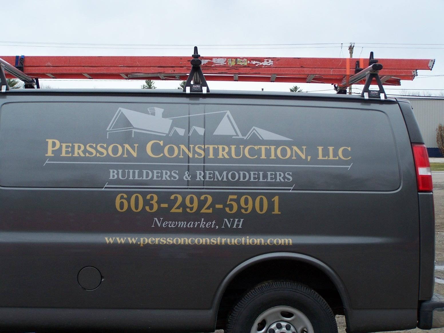 A persson construction van with a ladder on top of it