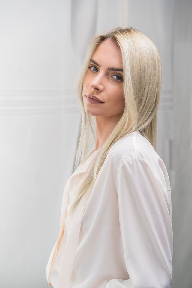 A Woman With Long Brown Hair — Coolum Cutting Edge in Coolum Beach, QLD