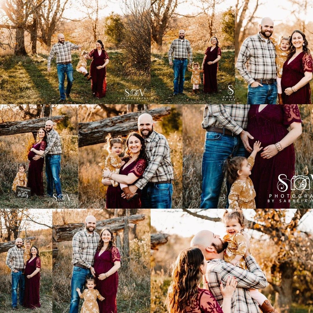 Family portrait session in a field. Pregnant woman in red dress with husband and child. Sunlight, natural setting.