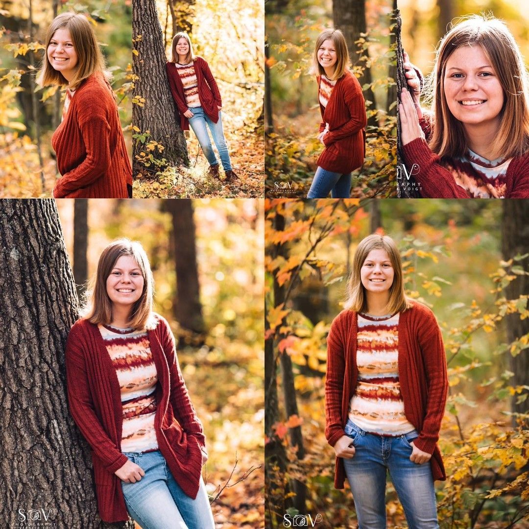 Woman in red sweater and jeans poses in autumn forest.