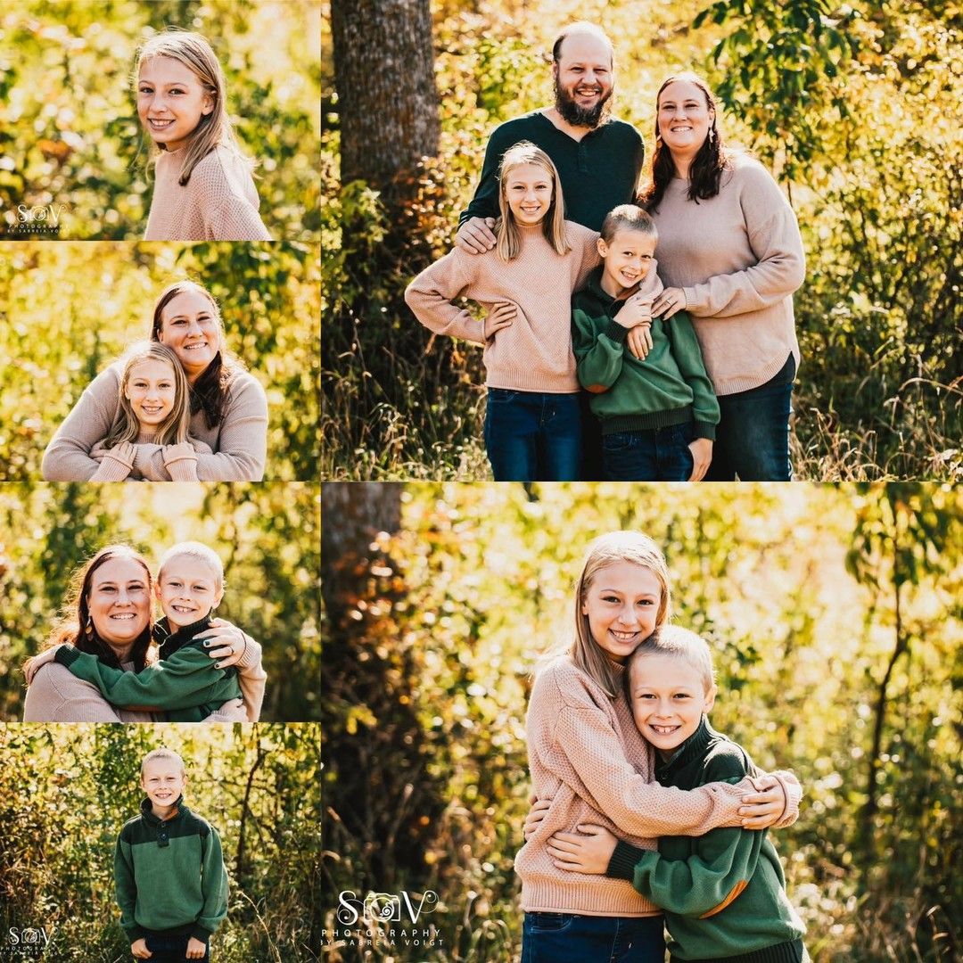 Family portrait in a sunlit outdoor setting. Smiling people wear sweaters. Autumn foliage.
