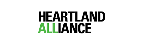 The heartland alliance logo is green and black on a white background.
